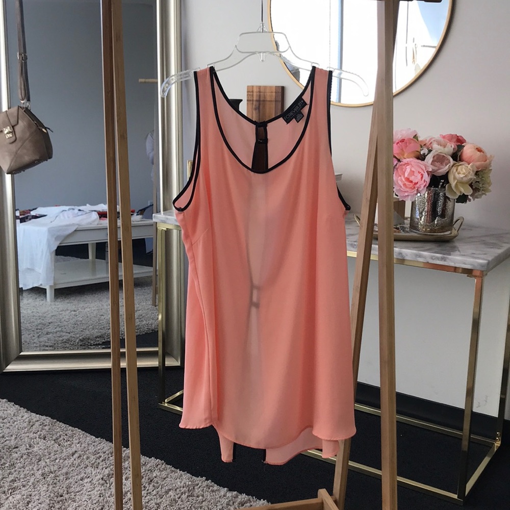 Tank with back cut-out
